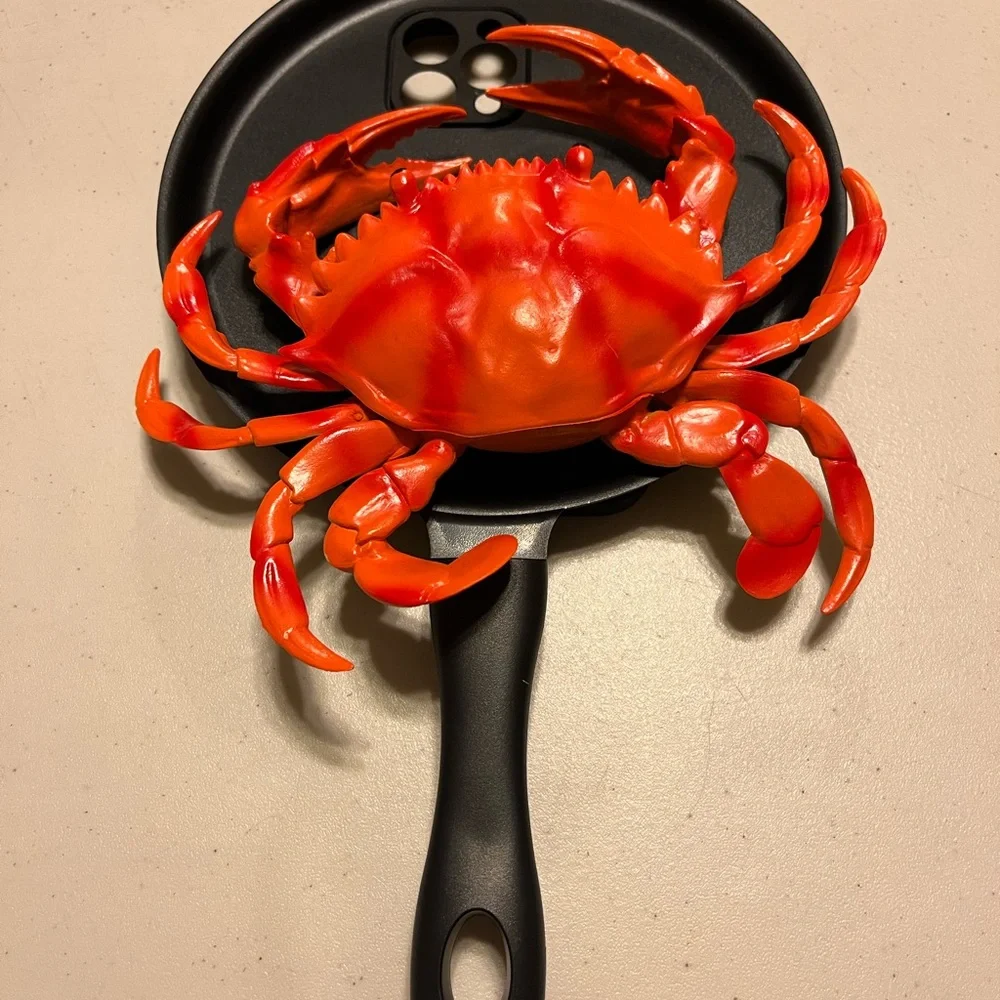 Lobster selfie stick holds phone for selfie